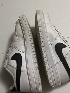 Nike White Low-Top Sneakers with Black Swoosh Accent